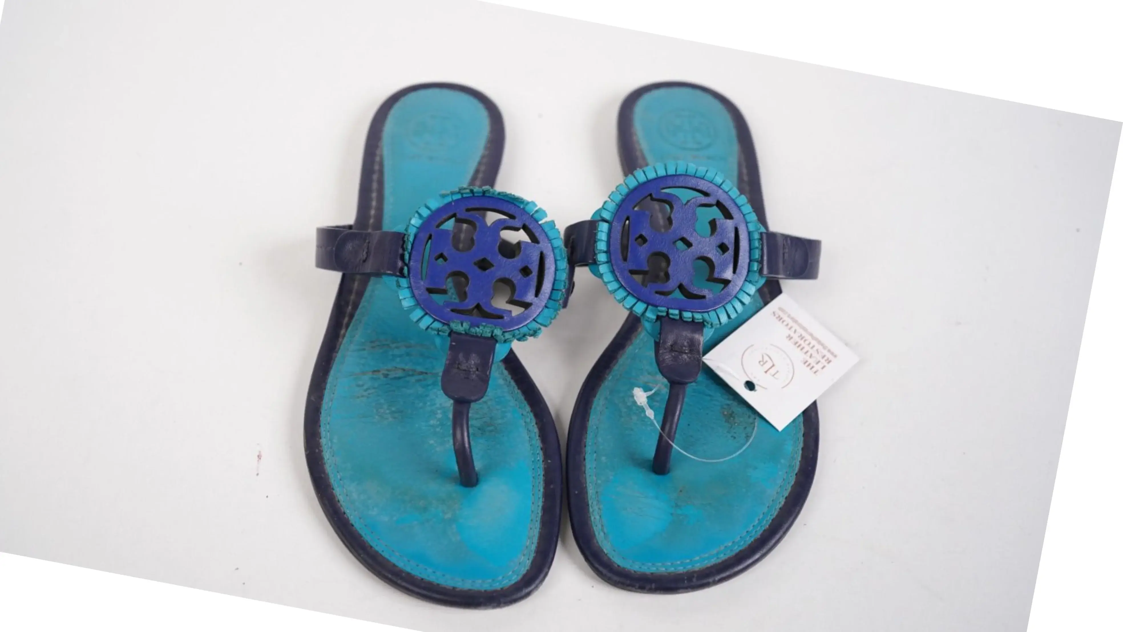 After Tory Burch slipper restoration smooth, even tone with restored lustre