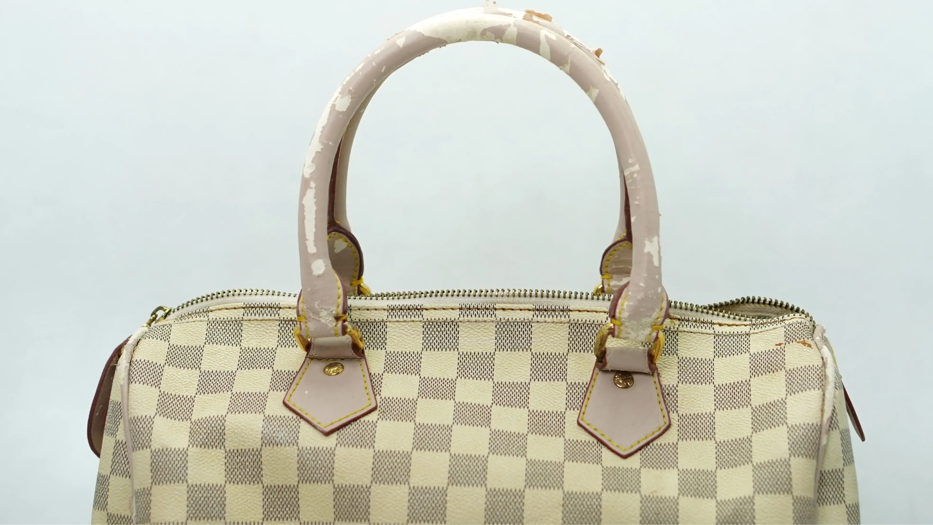 After Louis Vuitton handbag restoration new genuine leather handles perfectly matched and finished