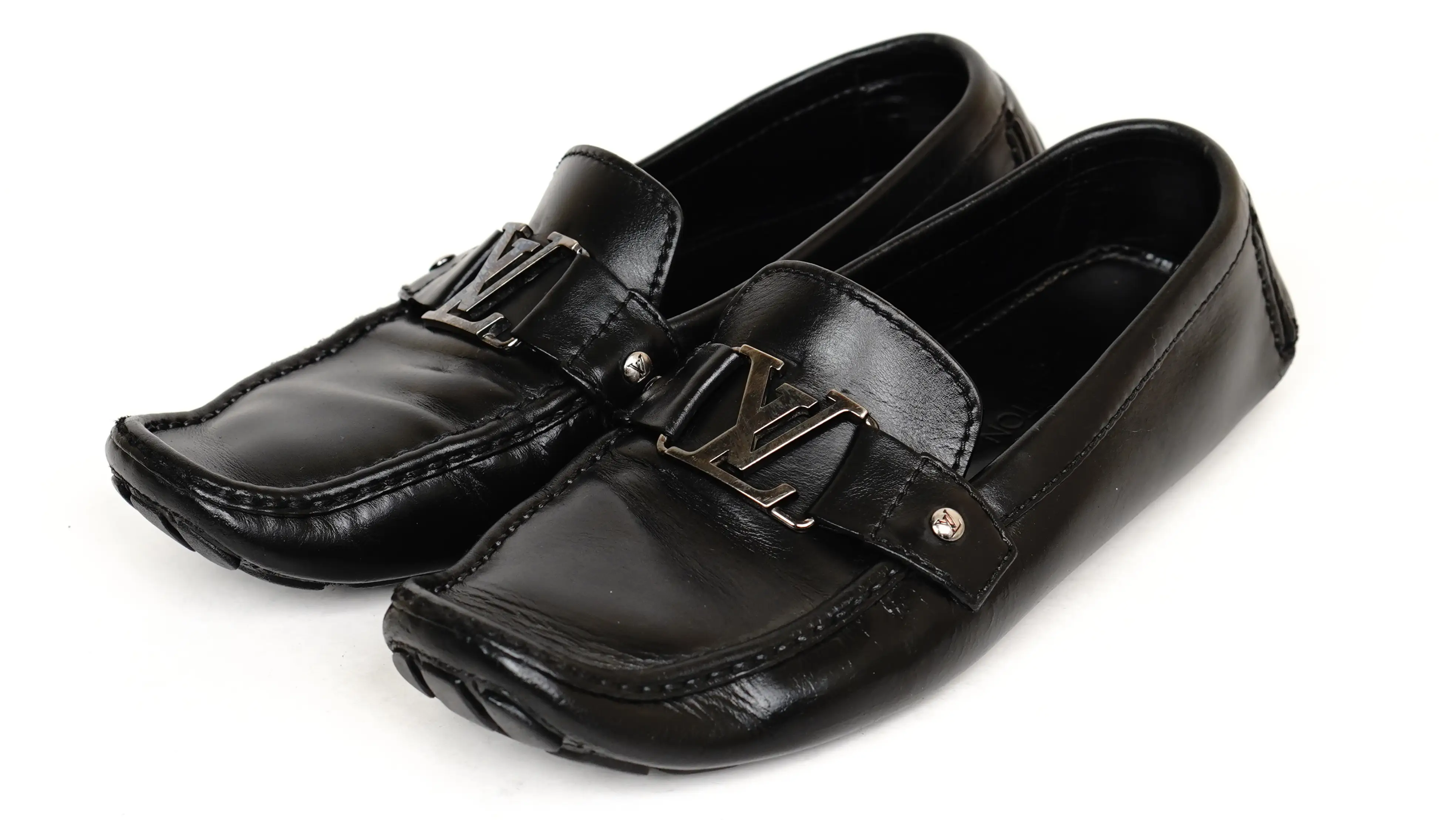 Before Louis Vuitton loafers restoration faded leather with surface dullness